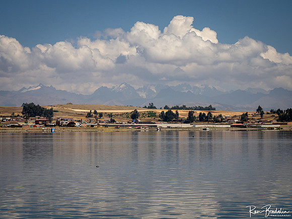 Kayaking on Lago Piuray - High Andes Peaks in the distance